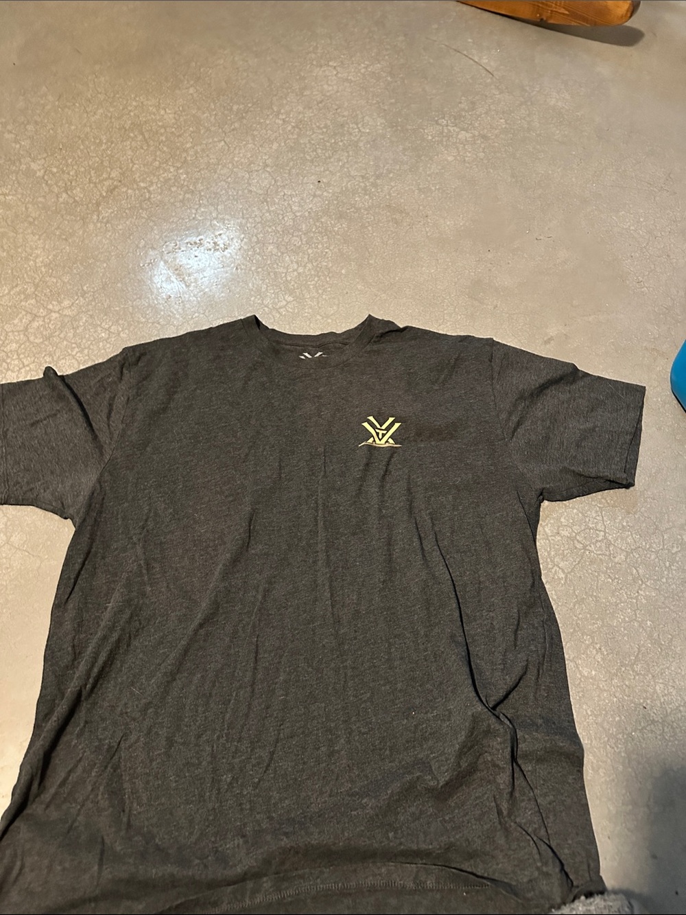 Men's Short-Sleeve Black Tee with Small Yellow Logo